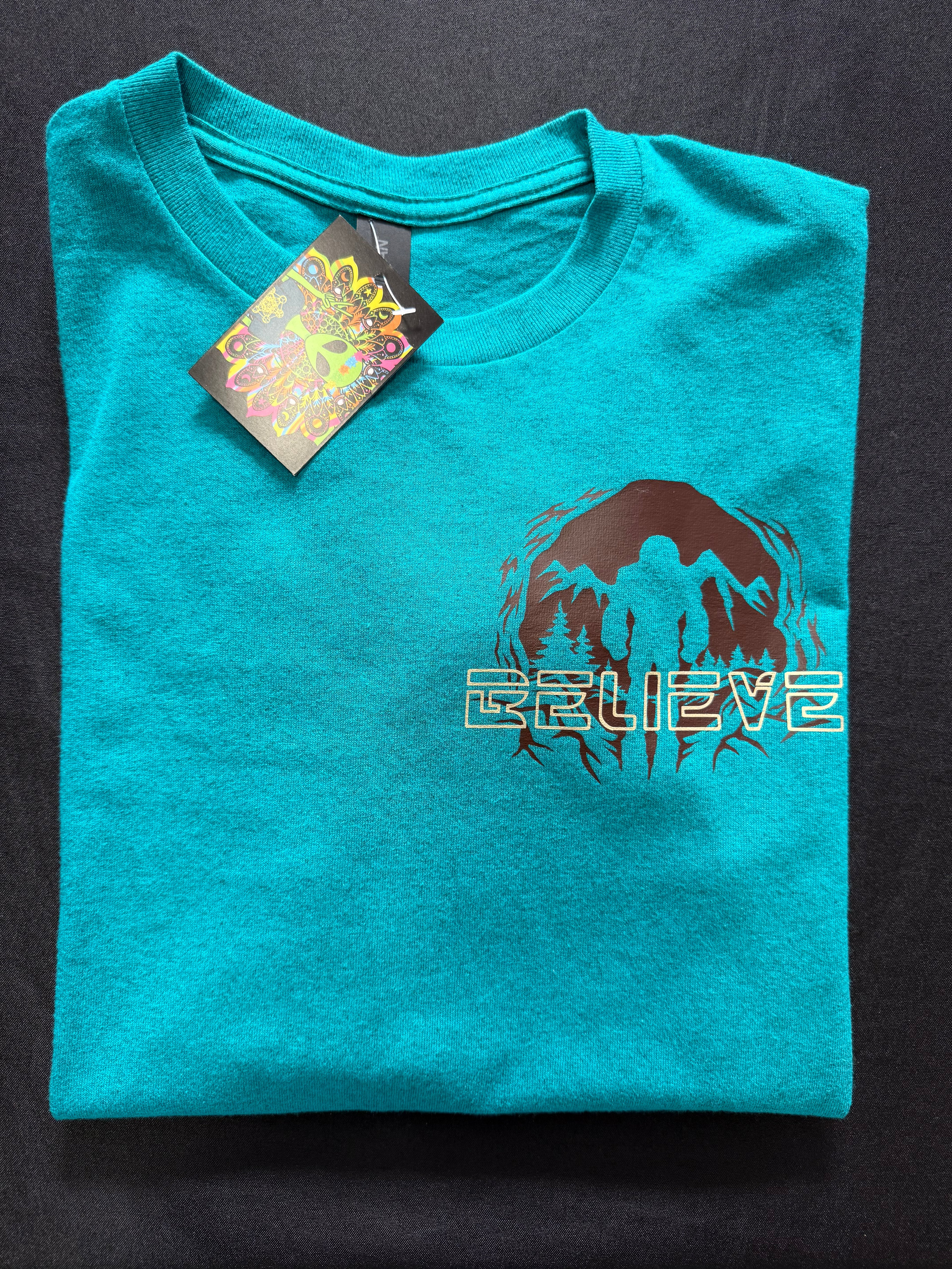 Bigfoot “Believe – Undefeated Hide and Seek Champion” Graphic T-Shirt